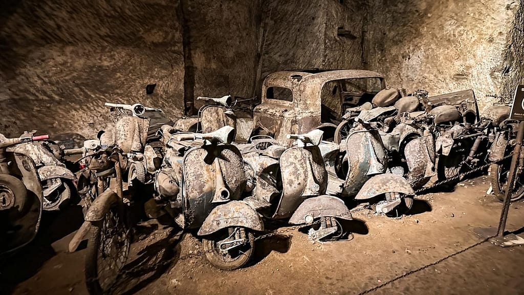 abandoned vespas in galleria borbonica tunnels